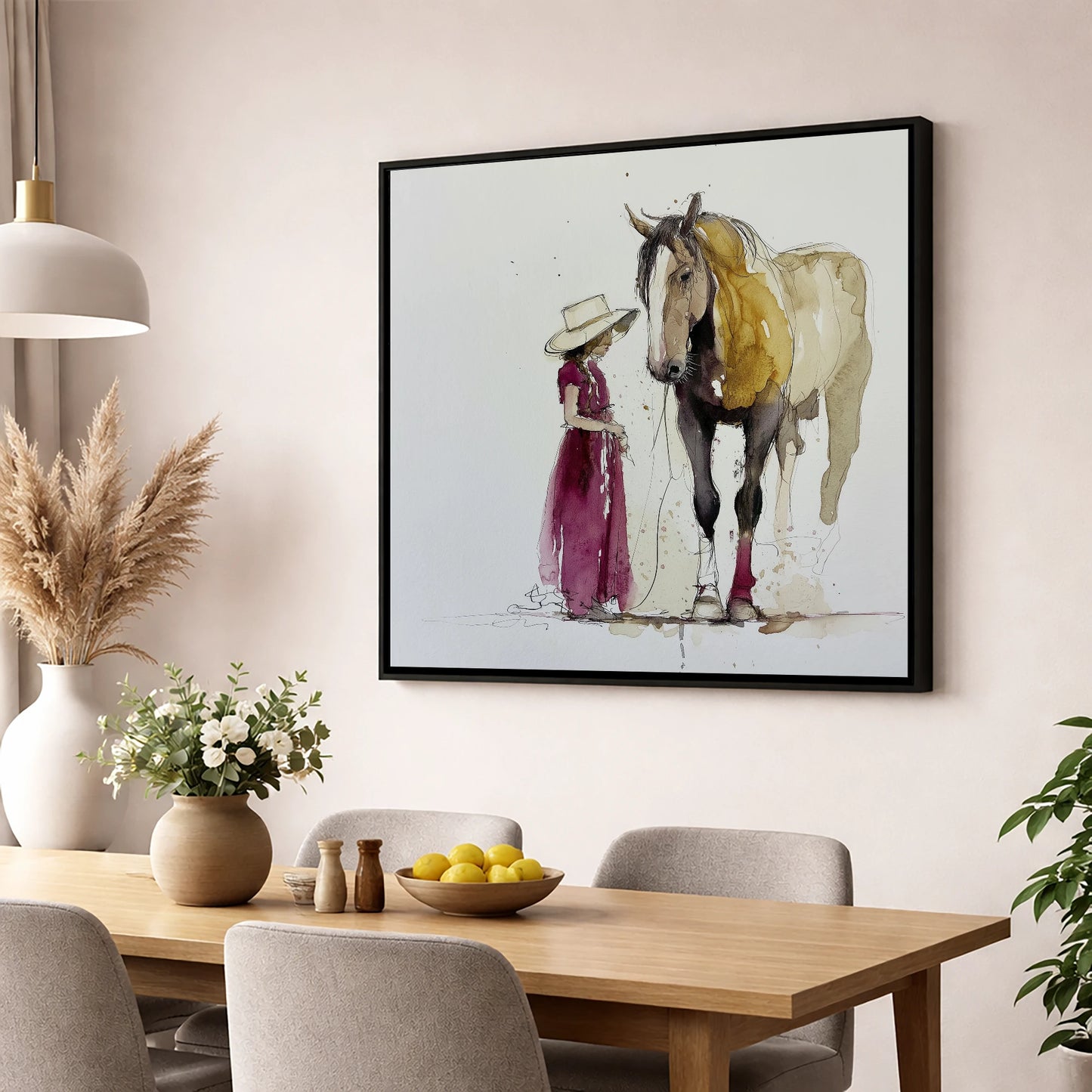 A Quiet Connection horse & rider wall art displayed in a dining room