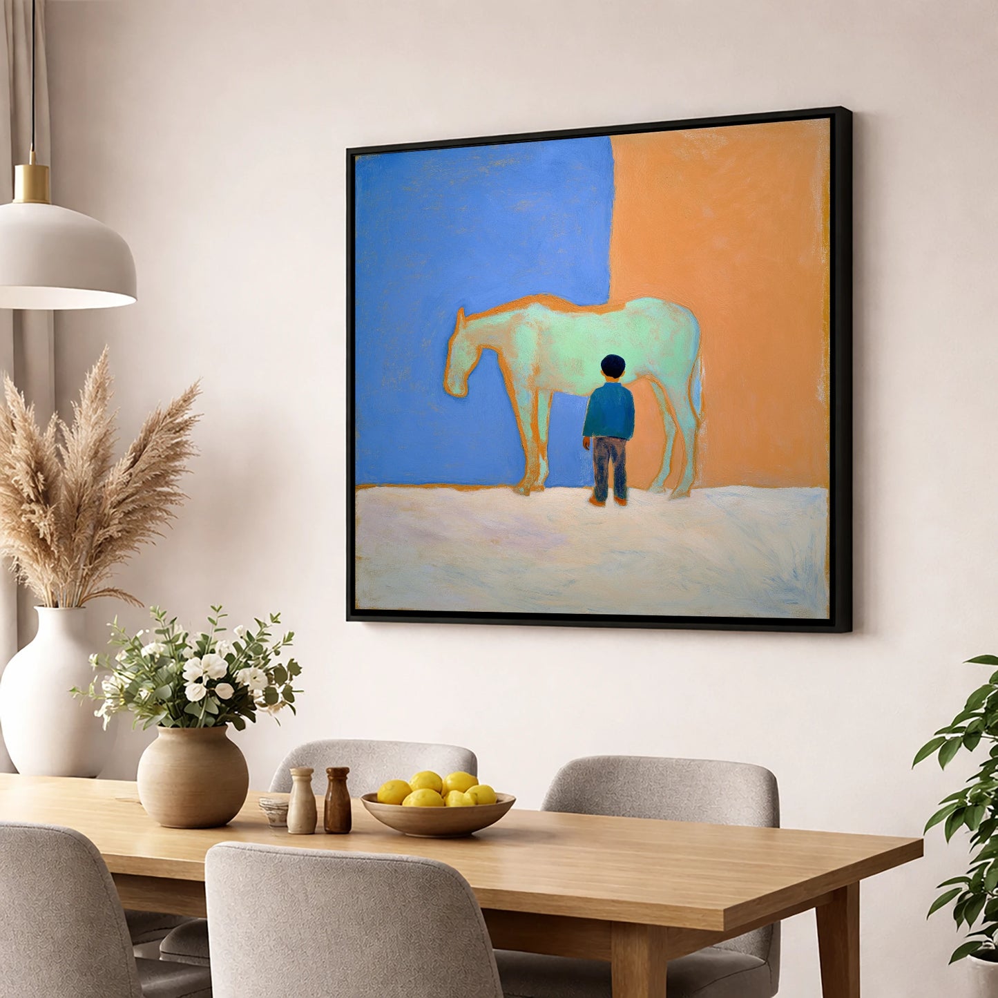 A Silent Understanding horse & rider wall art displayed in a dining room
