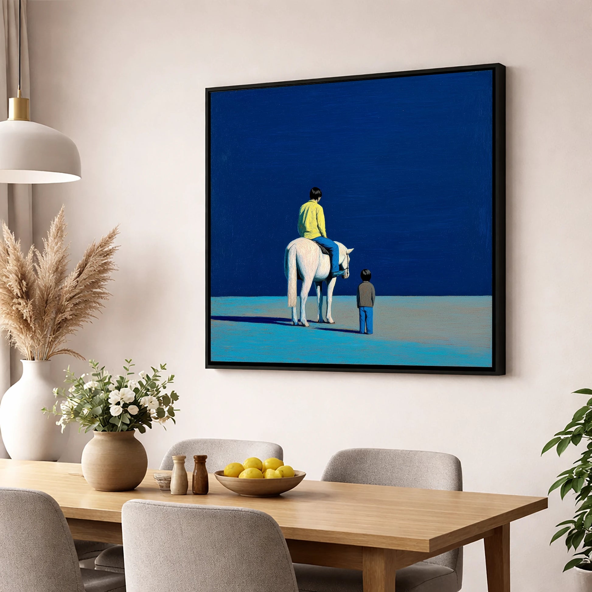 The Quiet Expanse horse & rider wall art displayed in a dining room