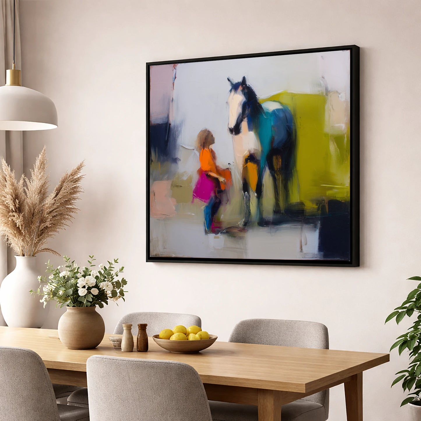 A Bold Understanding horse & rider wall art displayed in a dining room