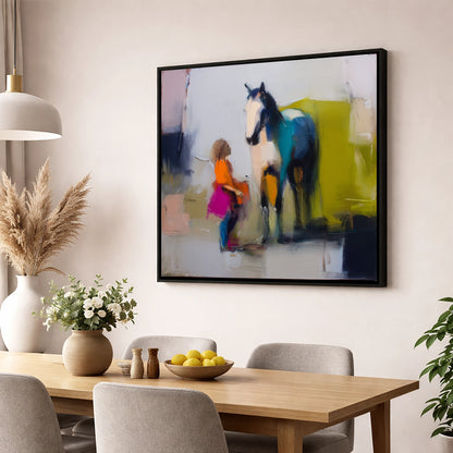 A Bold Understanding horse & rider wall art displayed in a dining room