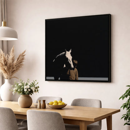 The Silent Bond horse & rider wall art displayed in a dining room