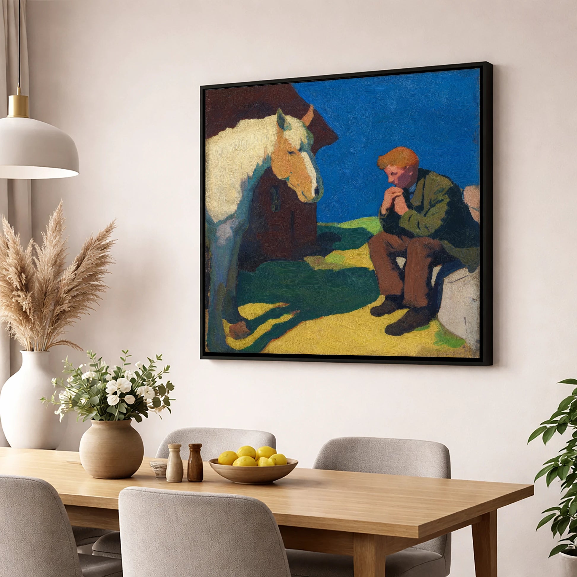 The Quiet Bond horse & rider wall art displayed in a dining room