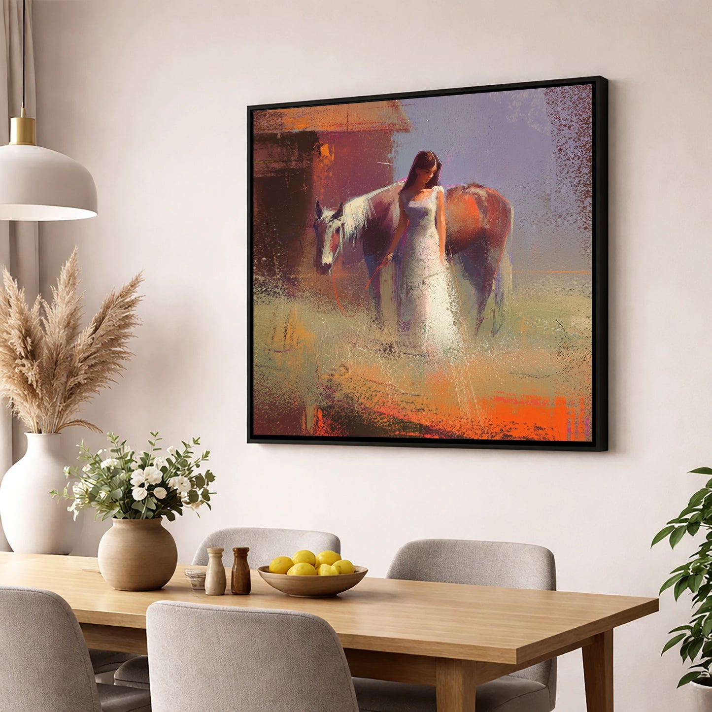 A Quiet Bond horse & rider wall art displayed in a dining room