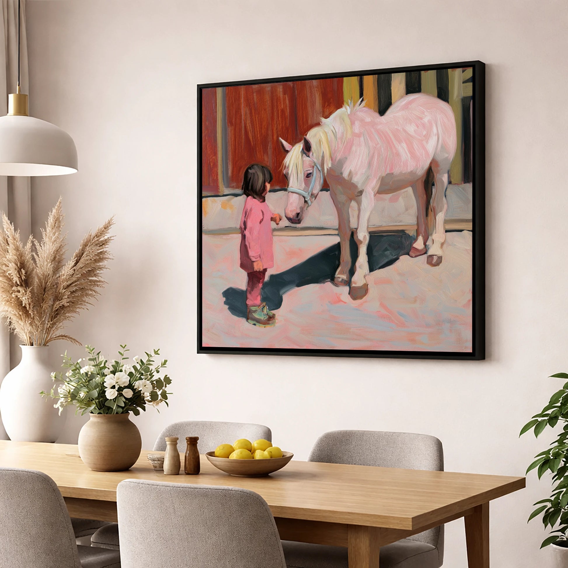 A Quiet Connection horse & rider wall art displayed in a dining room