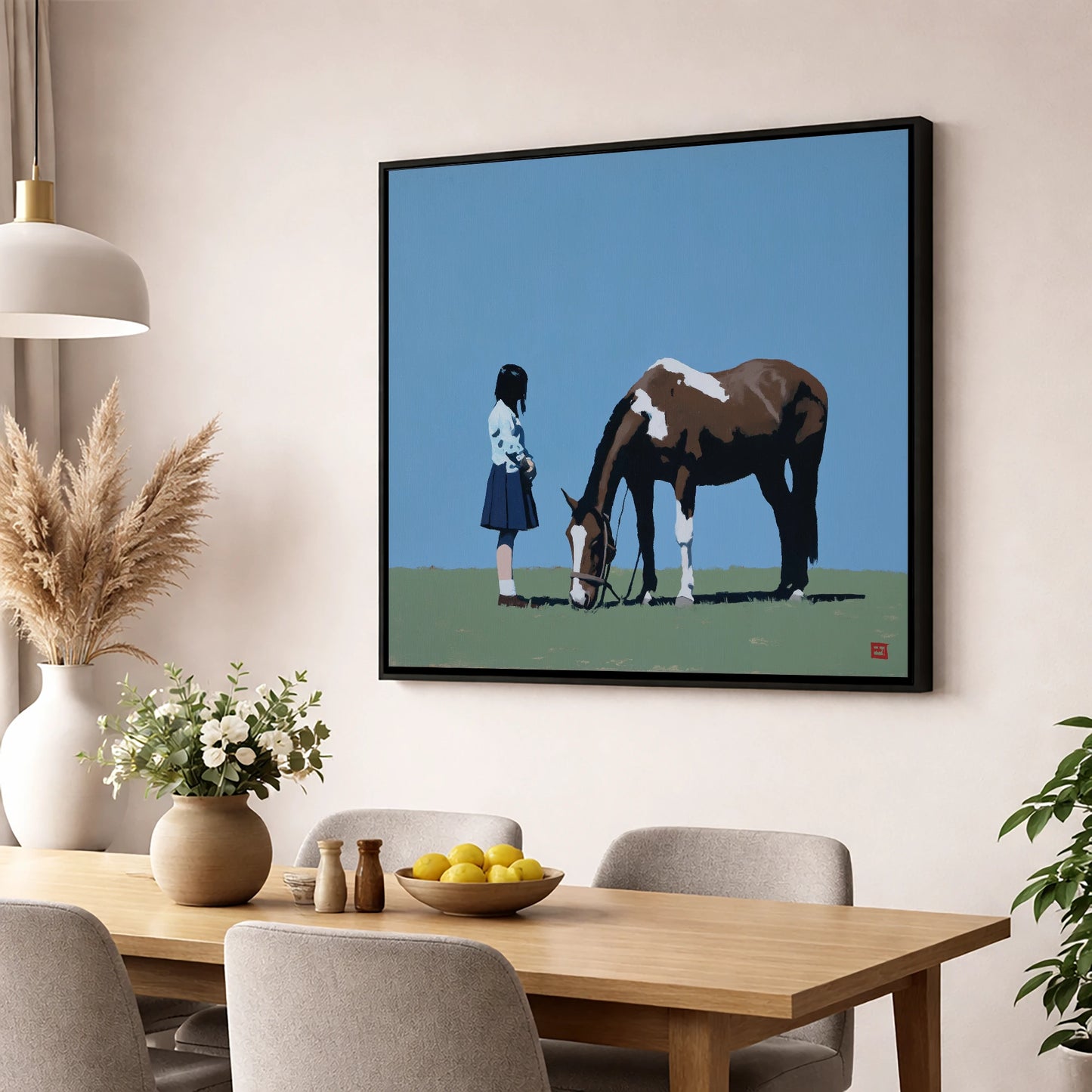 Silent Companionship horse & rider wall art displayed in a dining room