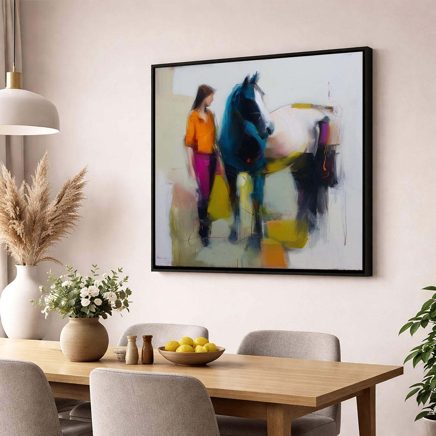 The Colour of Connection horse & rider wall art displayed in a dining room
