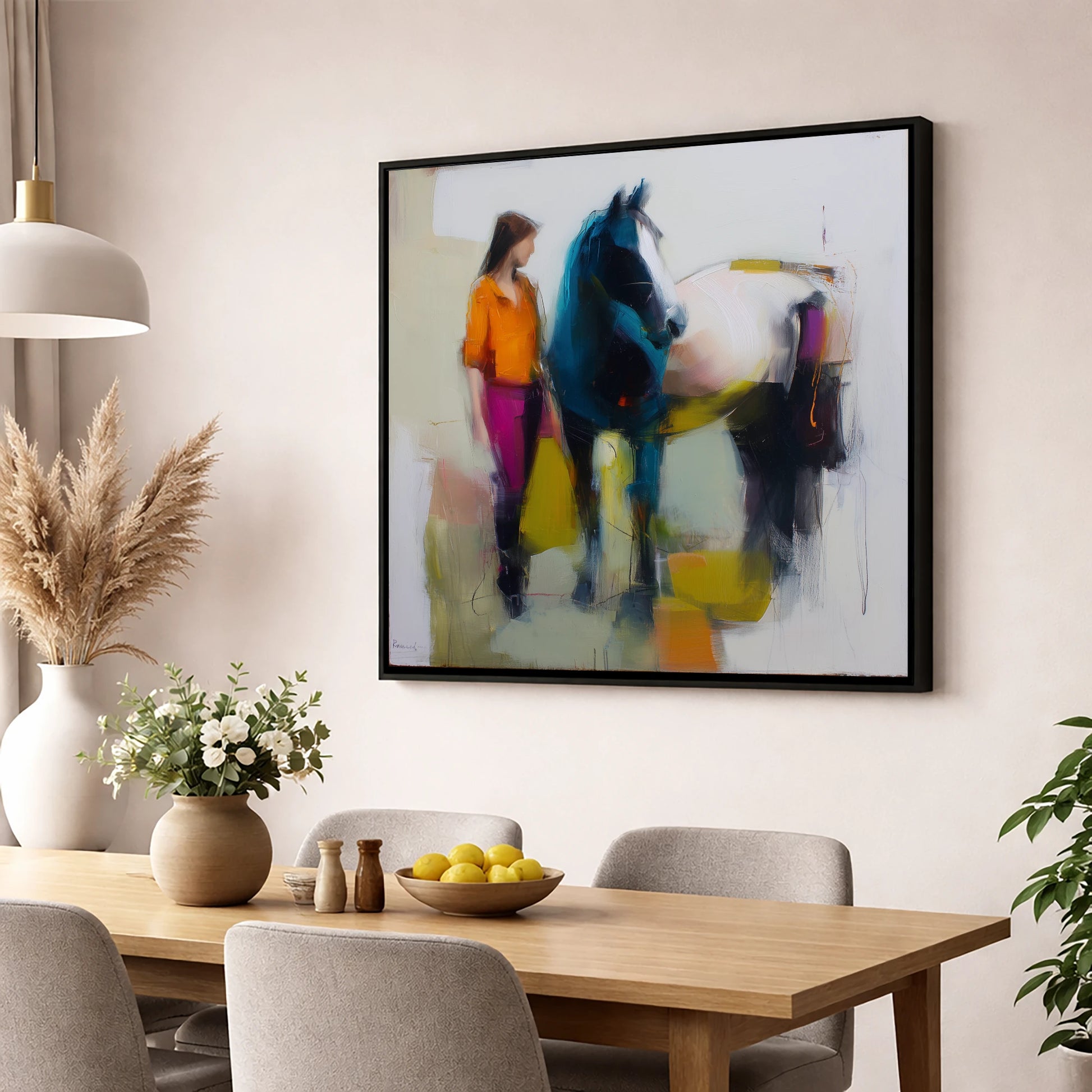 The Colour of Connection horse & rider wall art displayed in a dining room