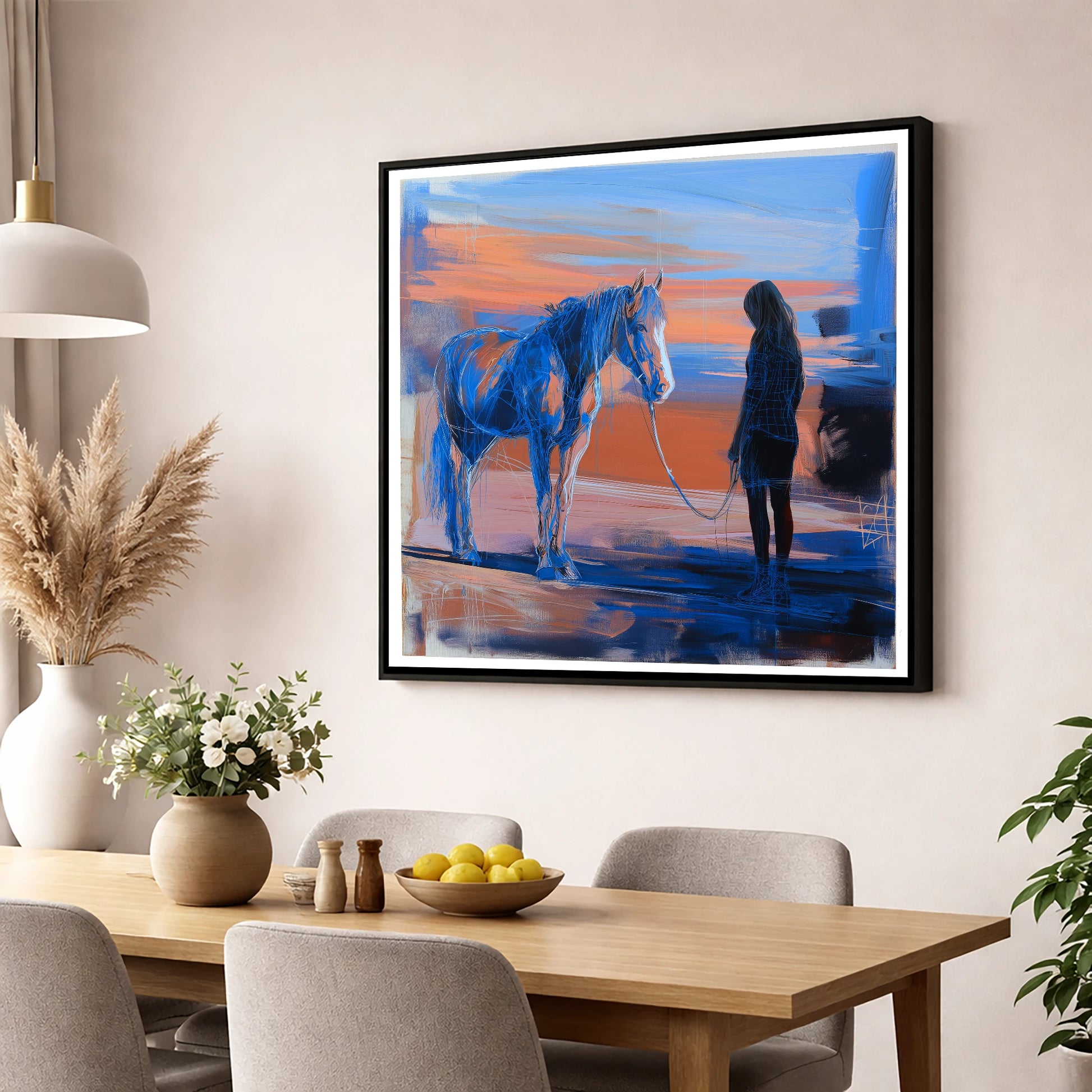 The Quiet Language horse & rider wall art displayed in a dining room