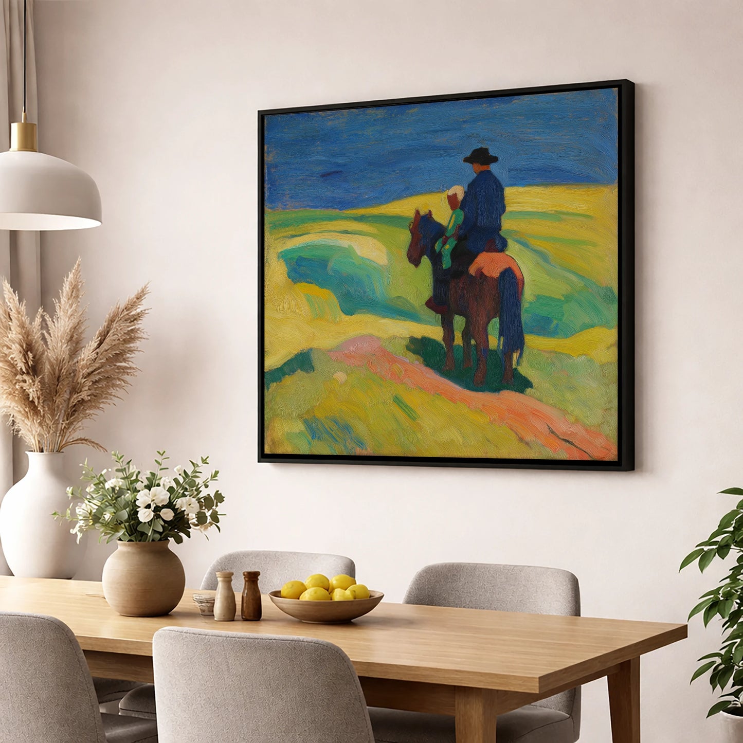 A Shared Horizon horse & rider wall art displayed in a dining room