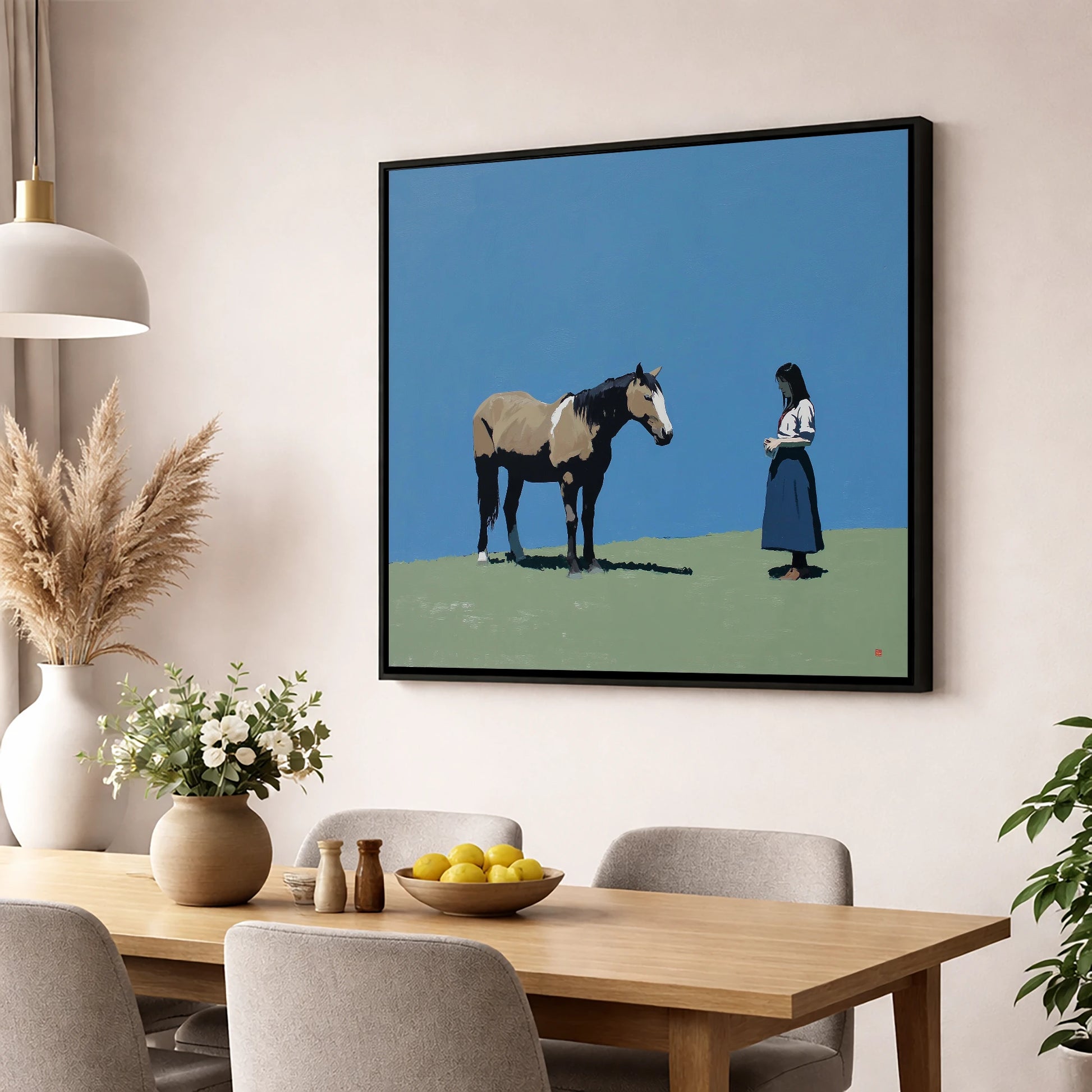 Silent Understanding horse & rider wall art displayed in a dining room