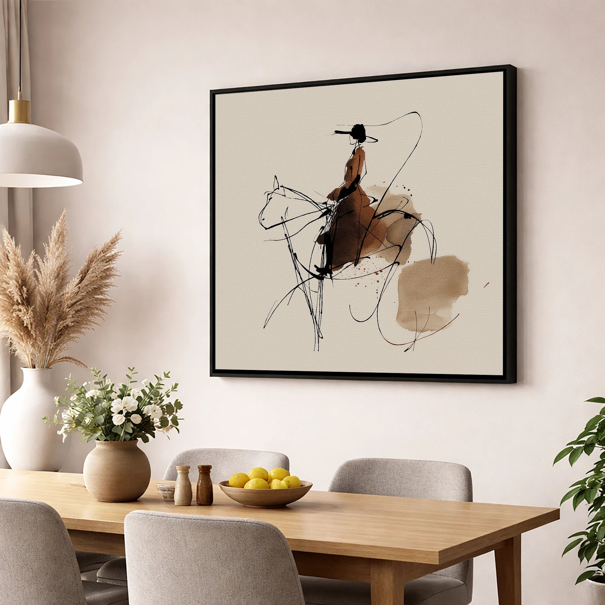 The Sepia Rider horse & rider wall art displayed in a dining room