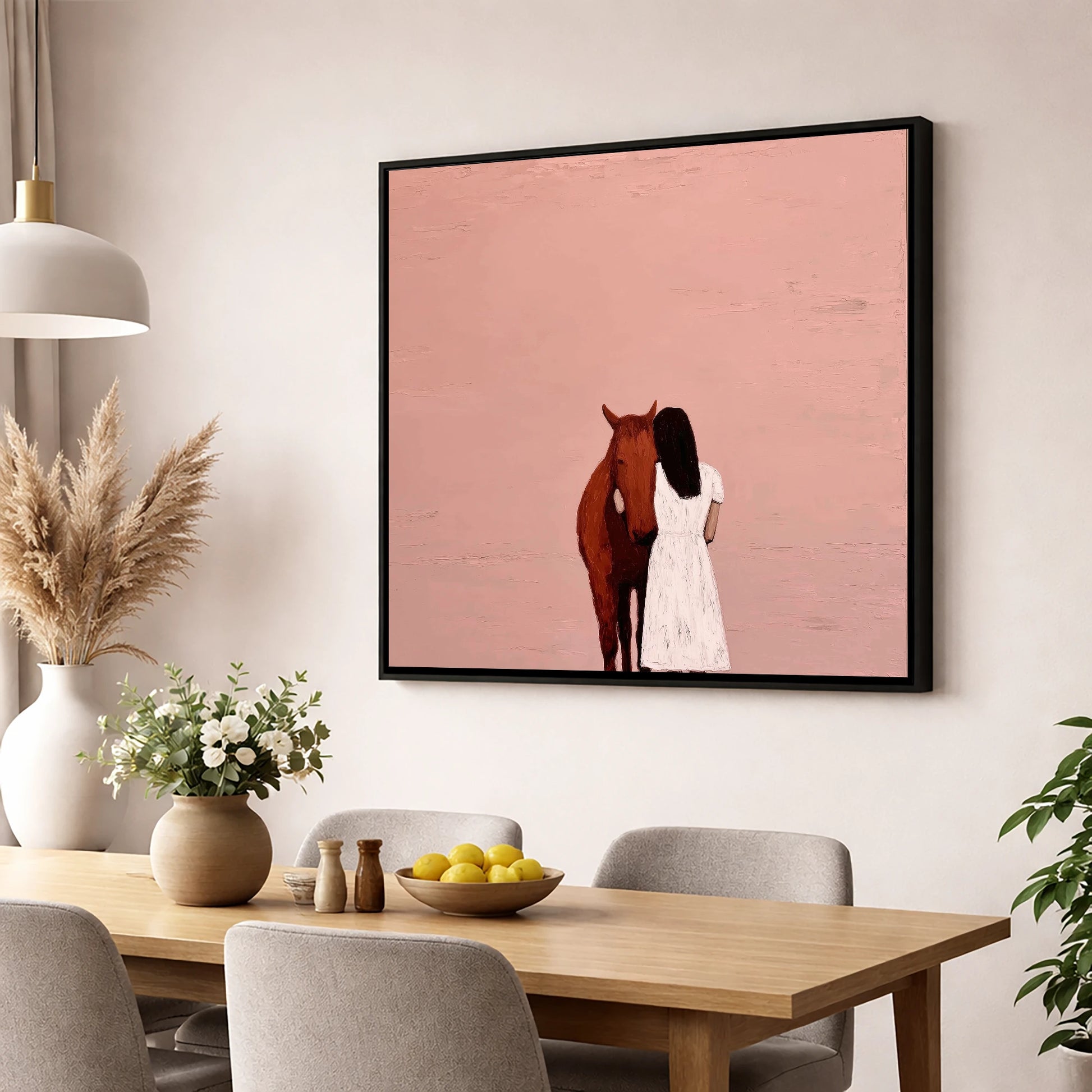 The Quiet Embrace horse & rider wall art displayed in a dining room