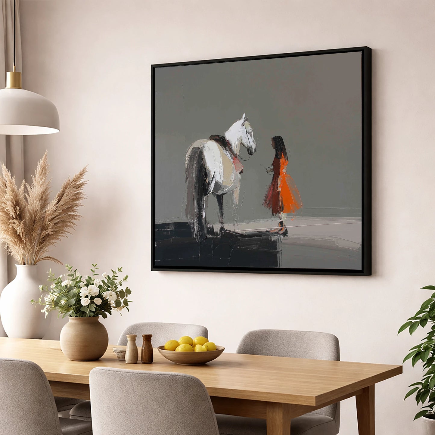 A Silent Dialogue horse & rider wall art displayed in a dining room