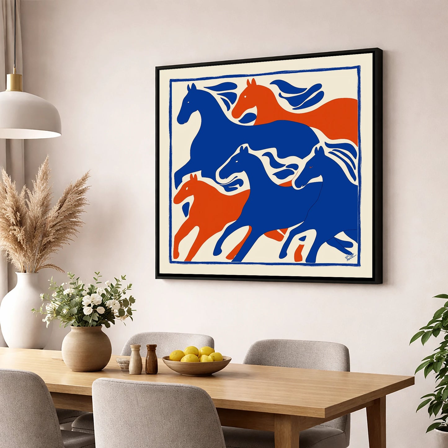 The Cobalt Herd wild horses wall art displayed in a dining room