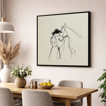 The Gentle Bond horse & rider wall art displayed in a dining room
