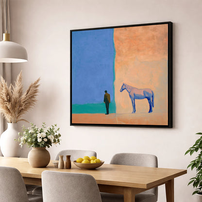 Between Blue and Sand horse & rider wall art displayed in a dining room