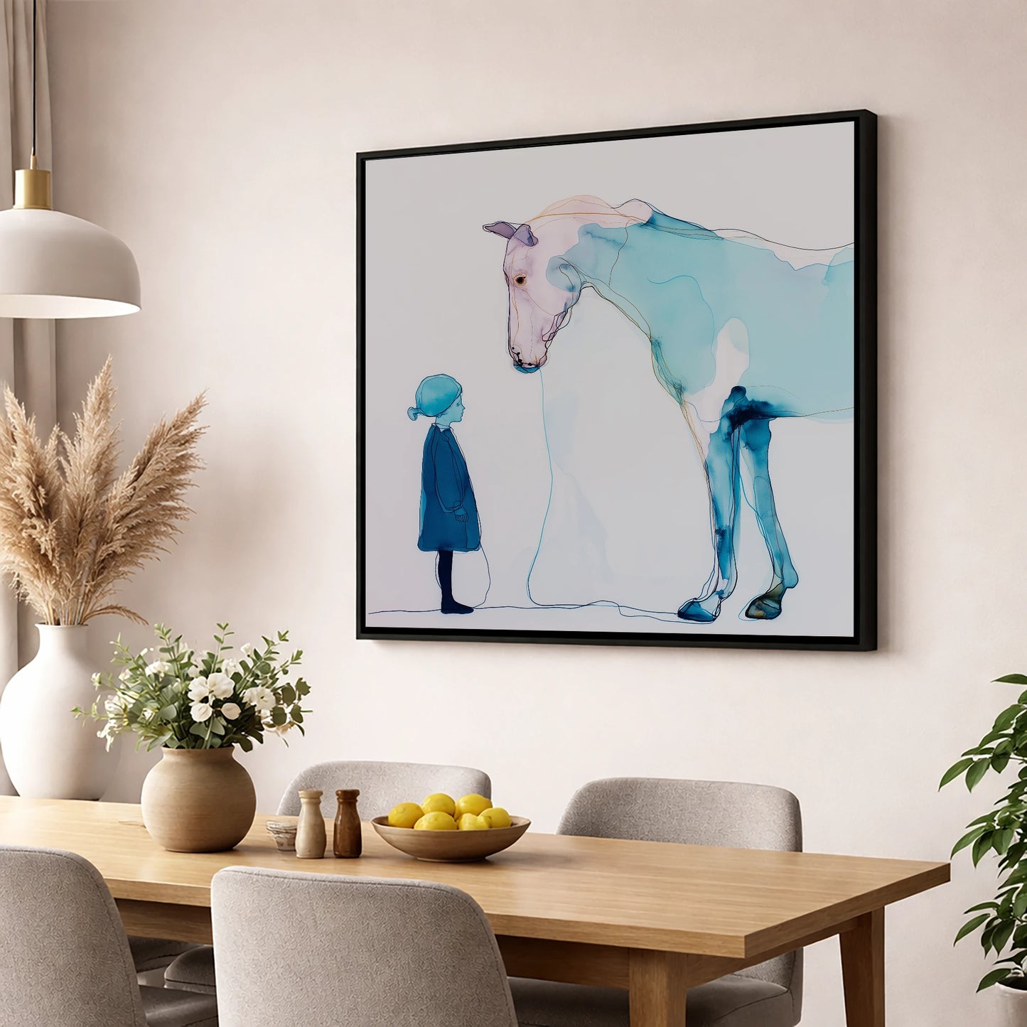 A Quiet Connection horse & rider wall art displayed in a dining room