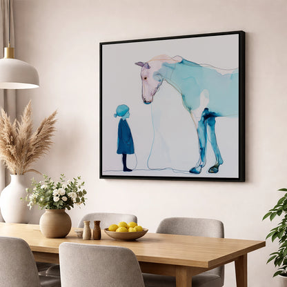 A Quiet Connection horse & rider wall art displayed in a dining room