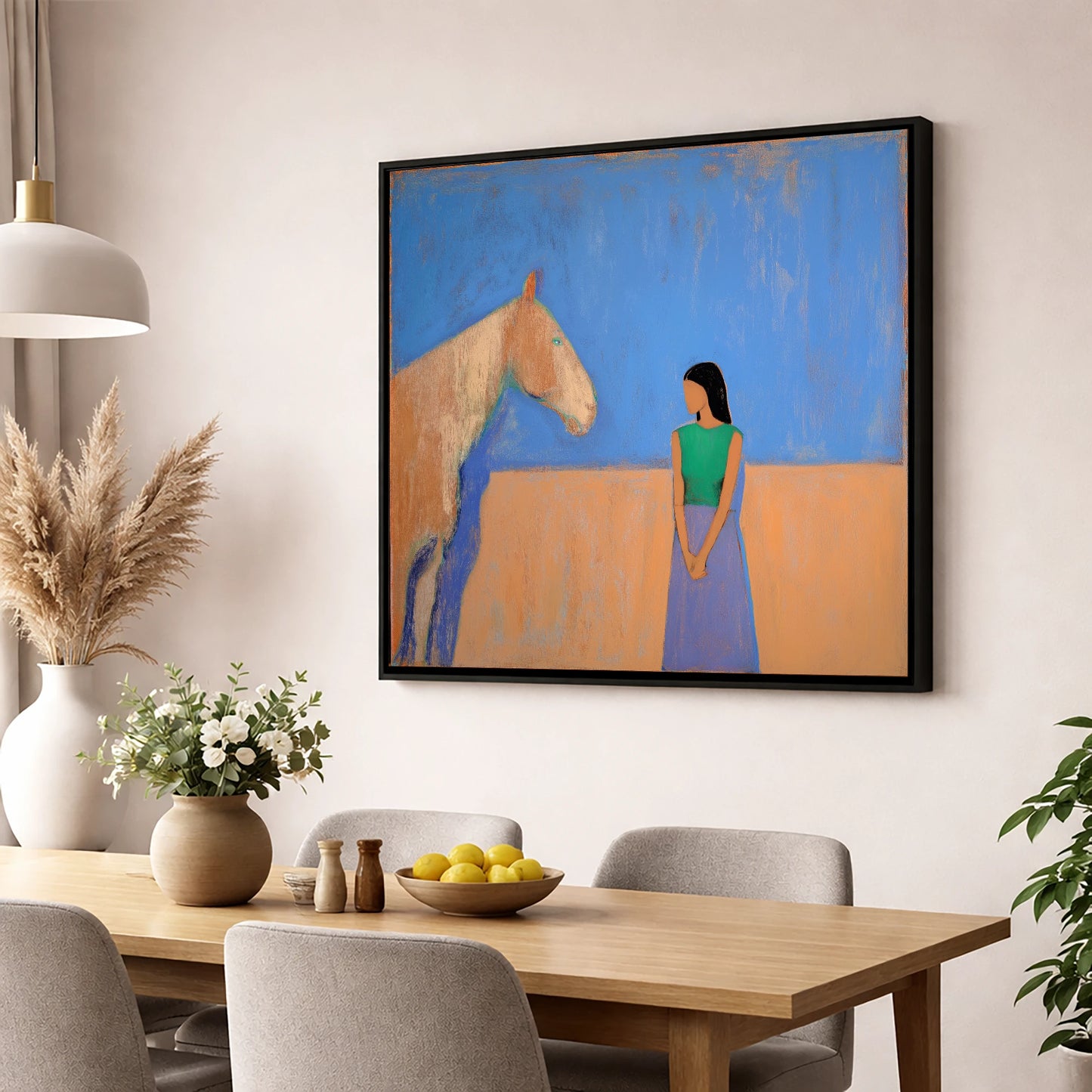 Silent Understanding horse & rider wall art displayed in a dining room