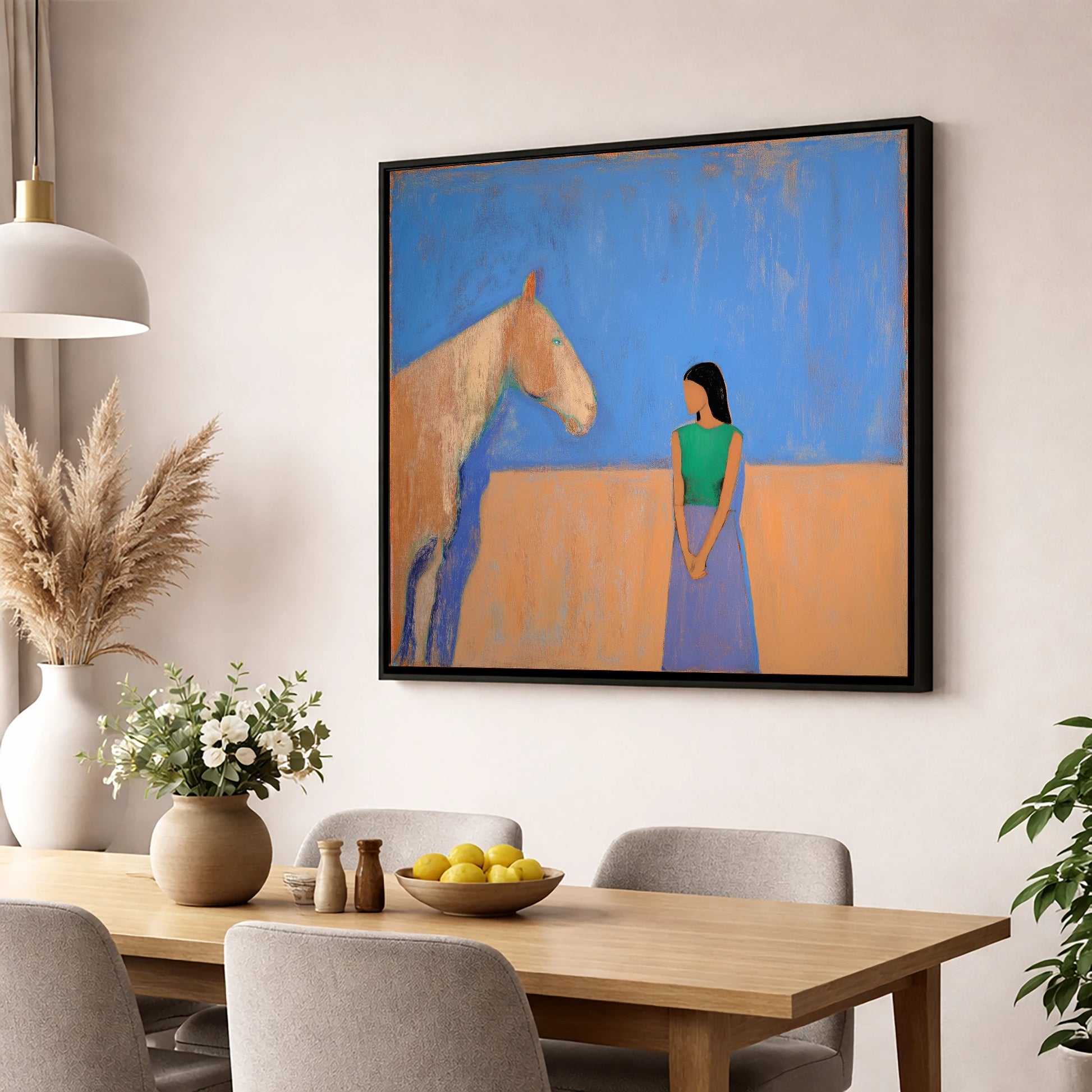 Silent Understanding horse & rider wall art displayed in a dining room