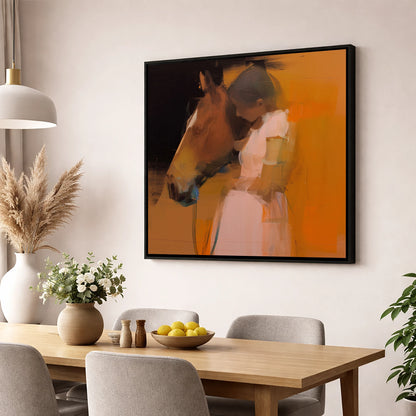 A Quiet Connection horse & rider wall art displayed in a dining room