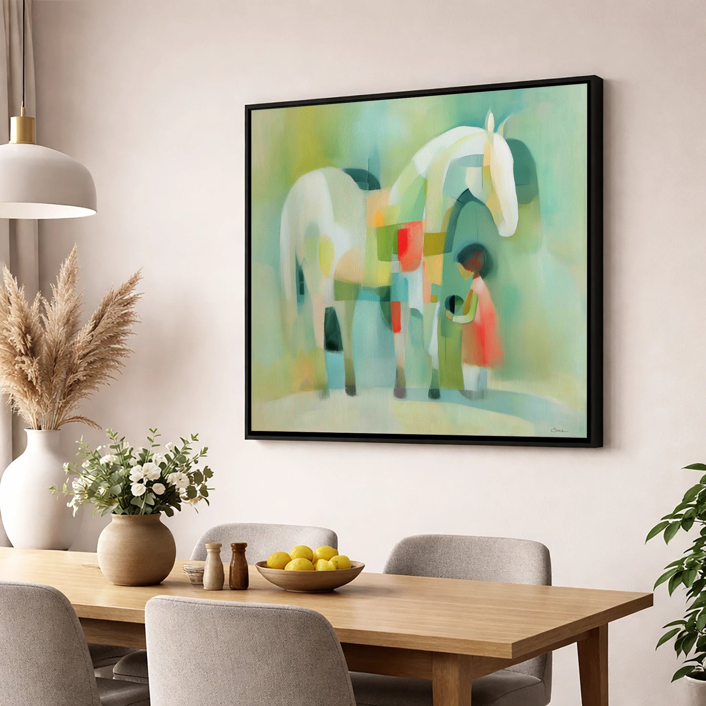 The Quiet Connection horse & rider wall art displayed in a dining room