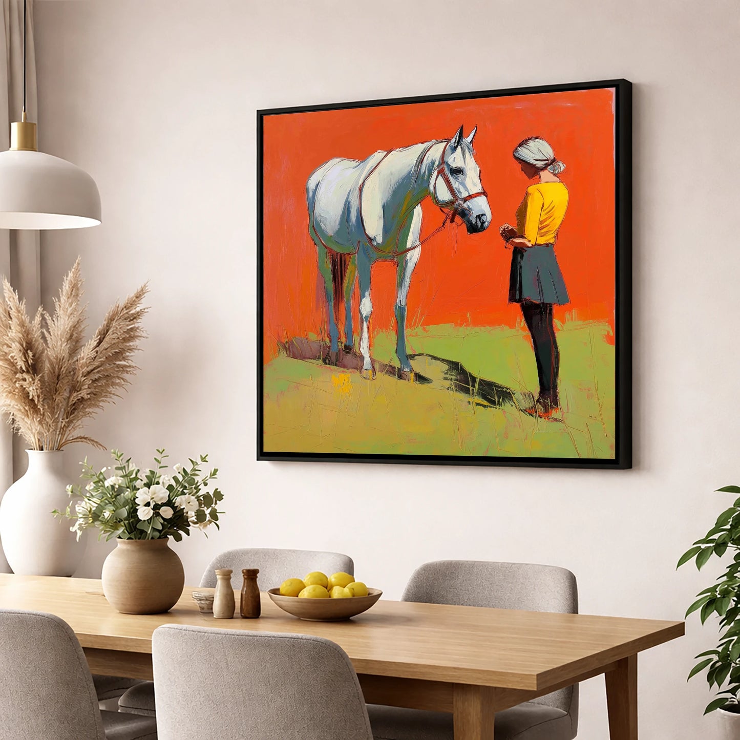 A Quiet Understanding horse & rider wall art displayed in a dining room