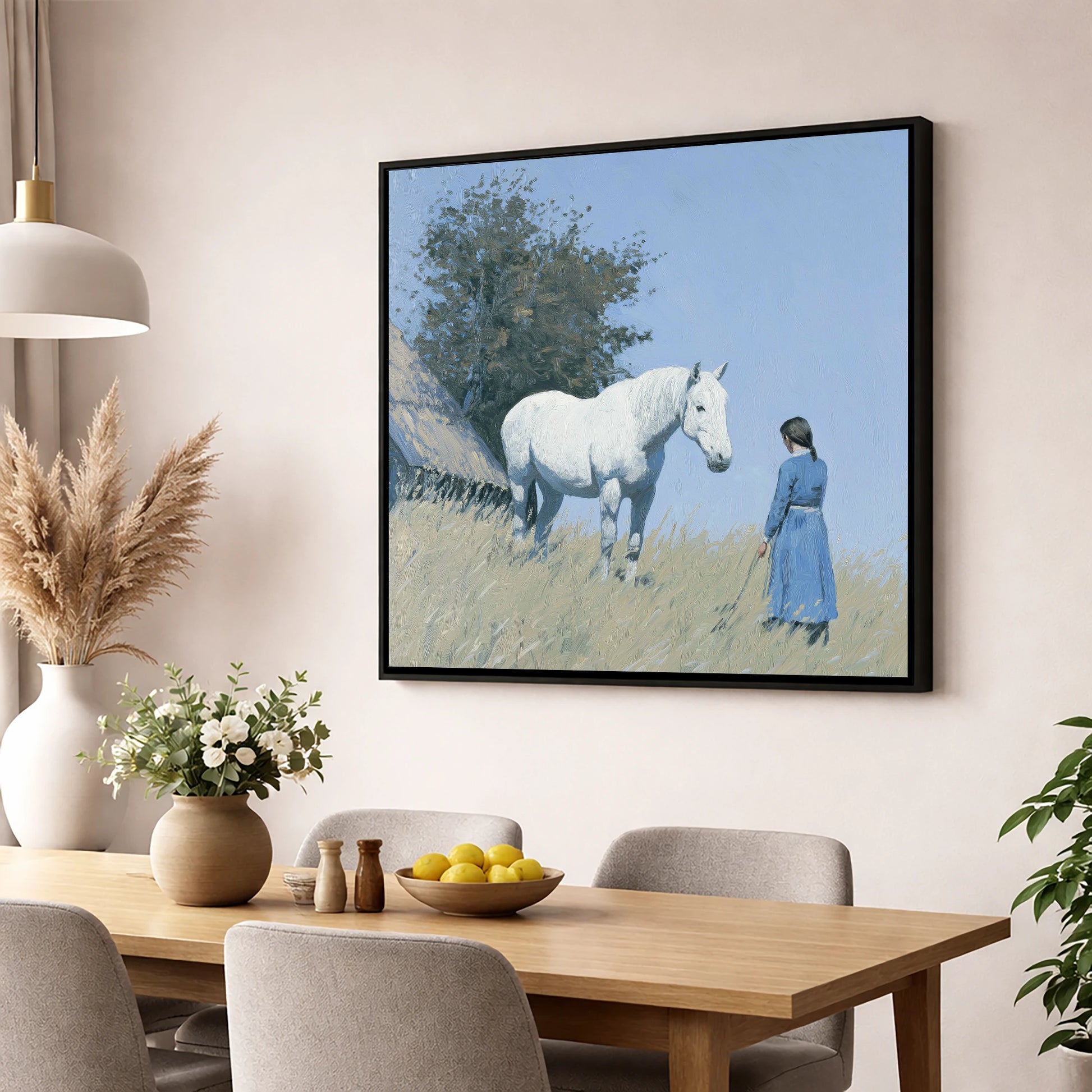 A Quiet Understanding horse & rider wall art displayed in a dining room