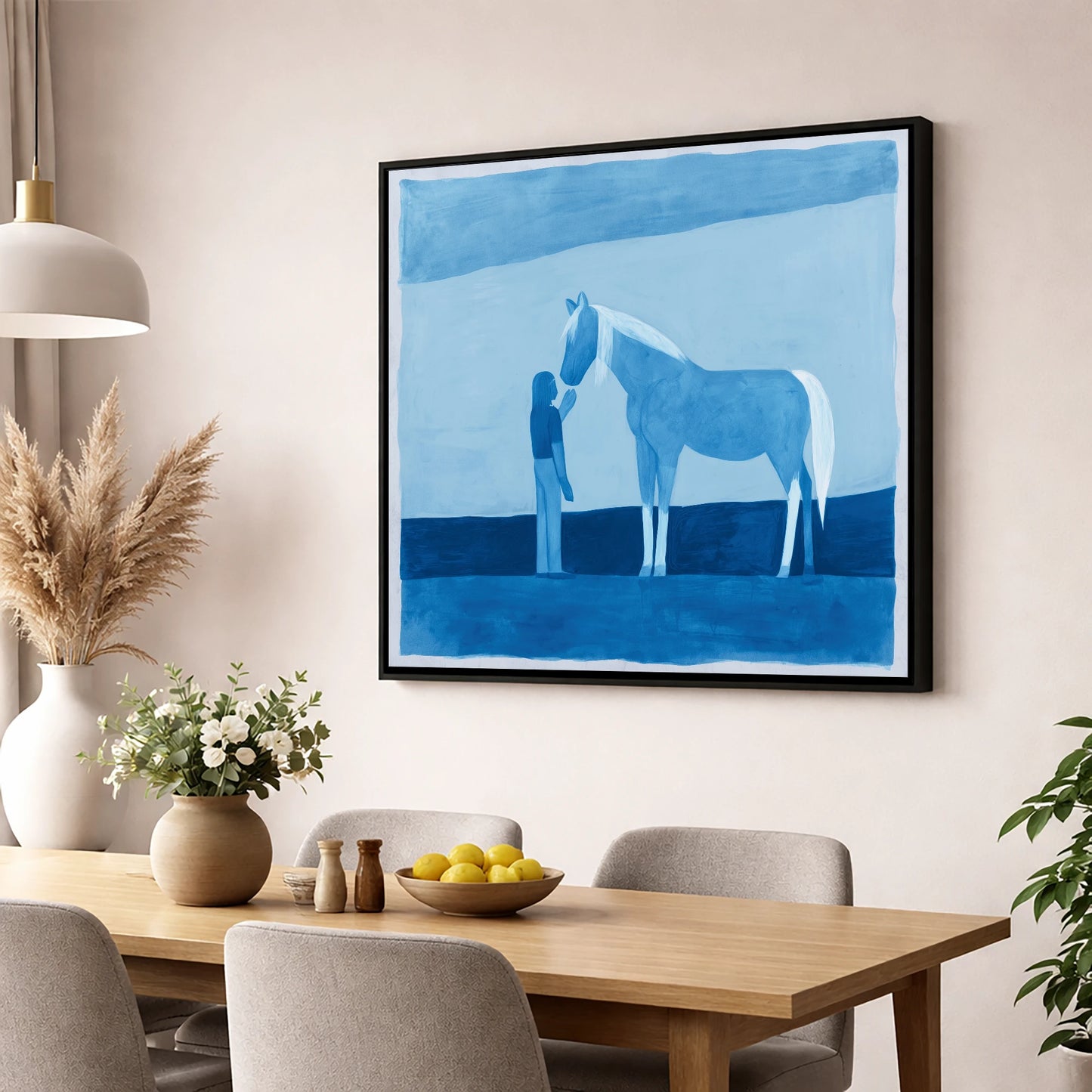 Cerulean Bond horse & rider wall art displayed in a dining room