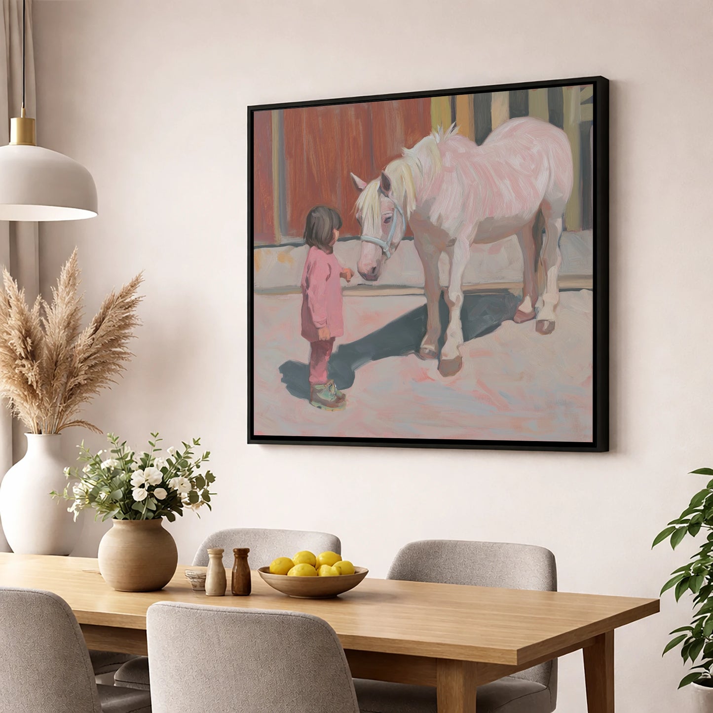 A Quiet Connection horse & rider wall art displayed in a dining room