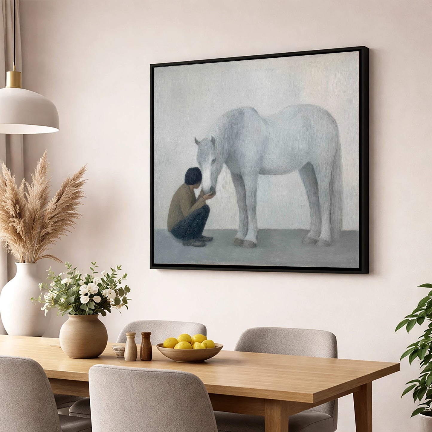 The Quiet Connection horse & rider wall art displayed in a dining room