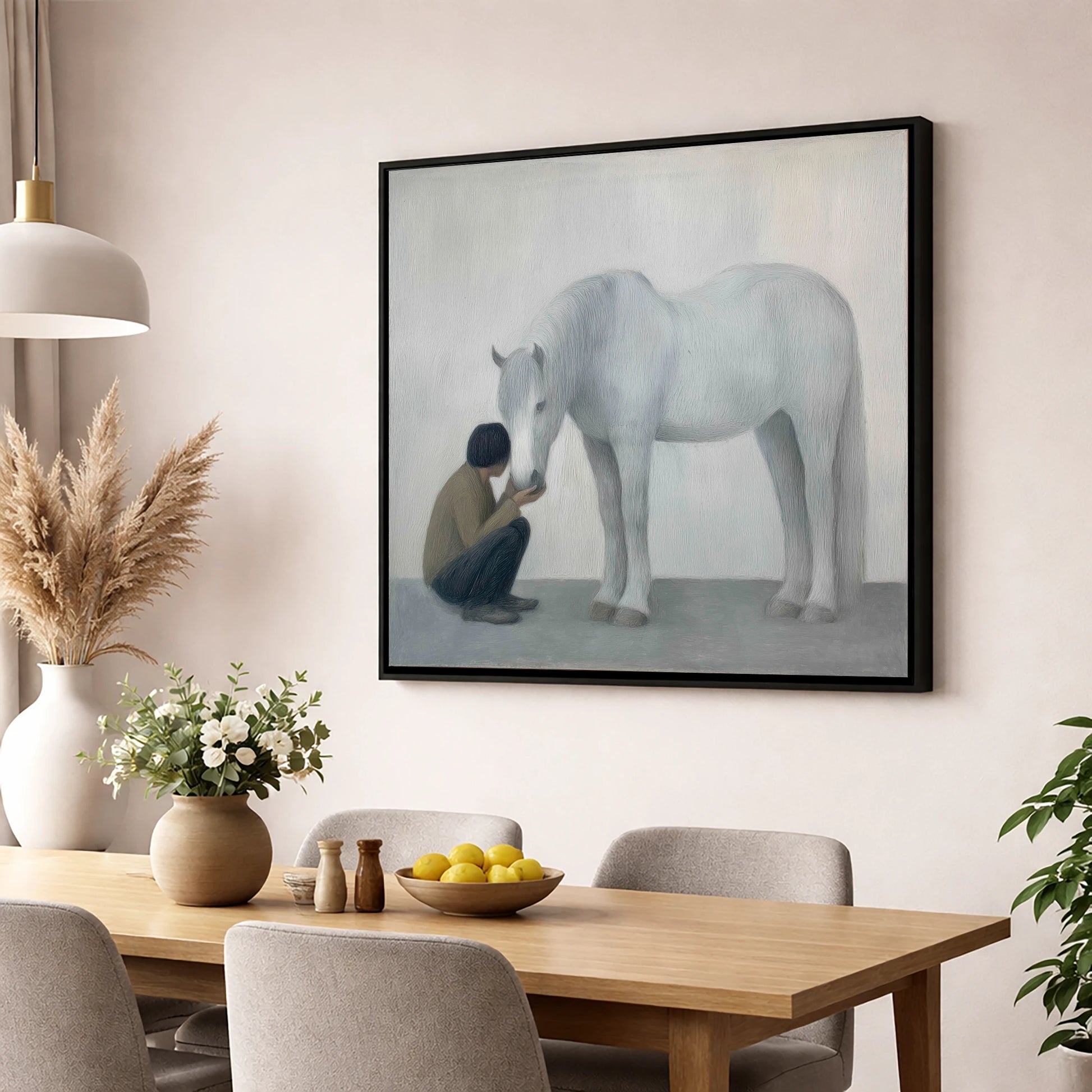 The Quiet Connection horse & rider wall art displayed in a dining room