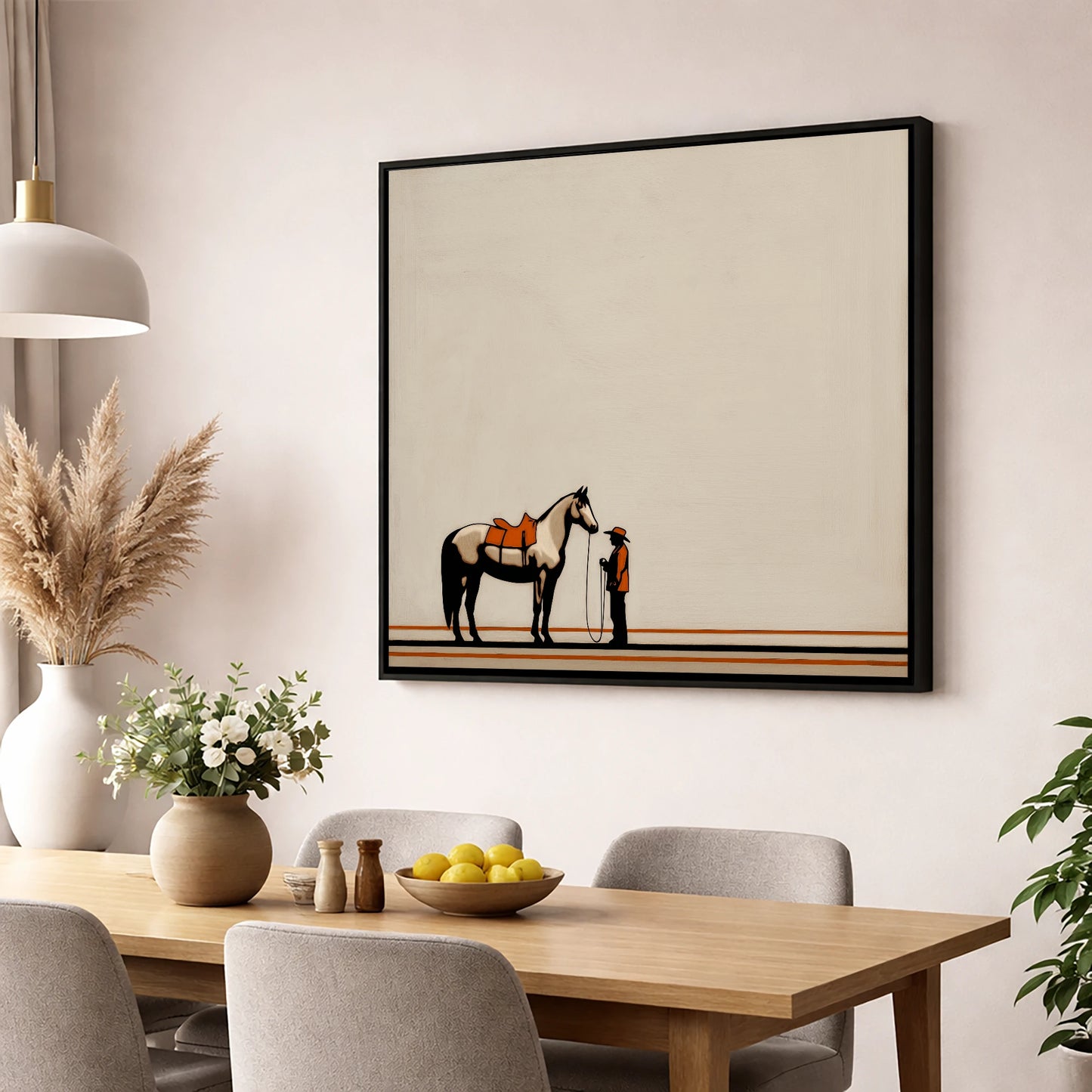 The Quiet Companion horse & rider wall art displayed in a dining room