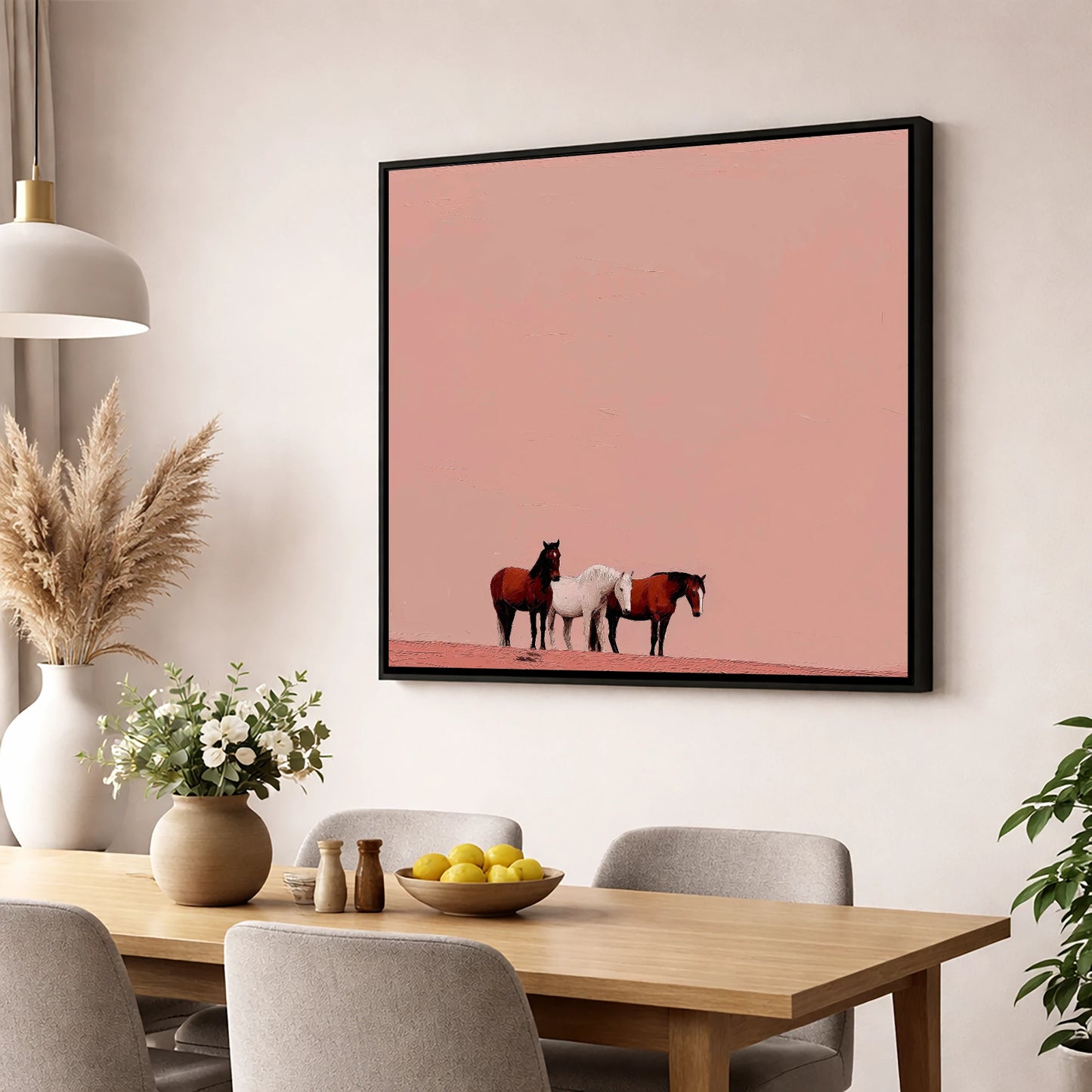 The Blush Horizon wild horses wall art displayed in a dining room