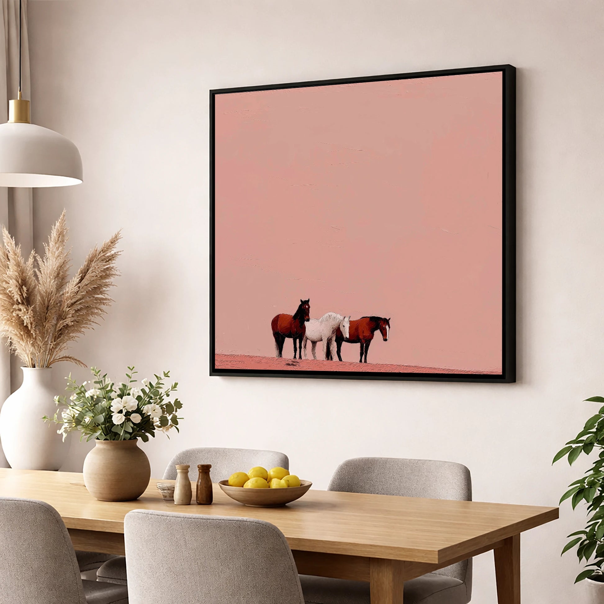 The Blush Horizon wild horses wall art displayed in a dining room