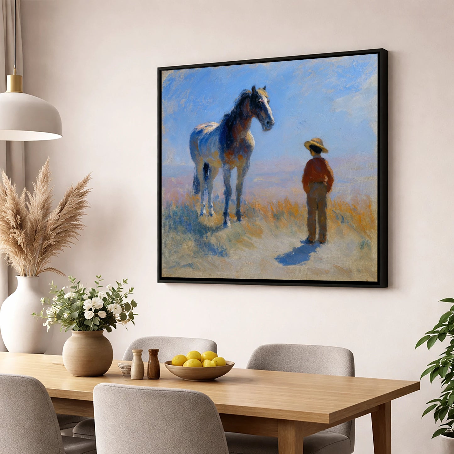 A Quiet Understanding horse & rider wall art displayed in a dining room