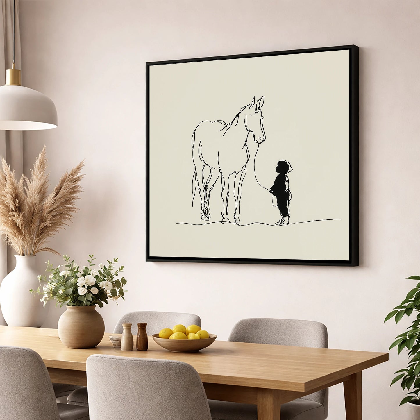 First Connection horse & rider wall art displayed in a dining room