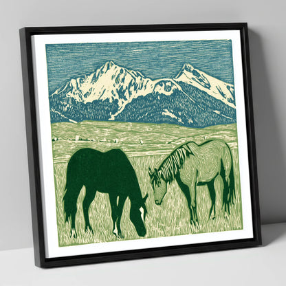 Alpine Grazing horse landscape canvas wall art in black frame