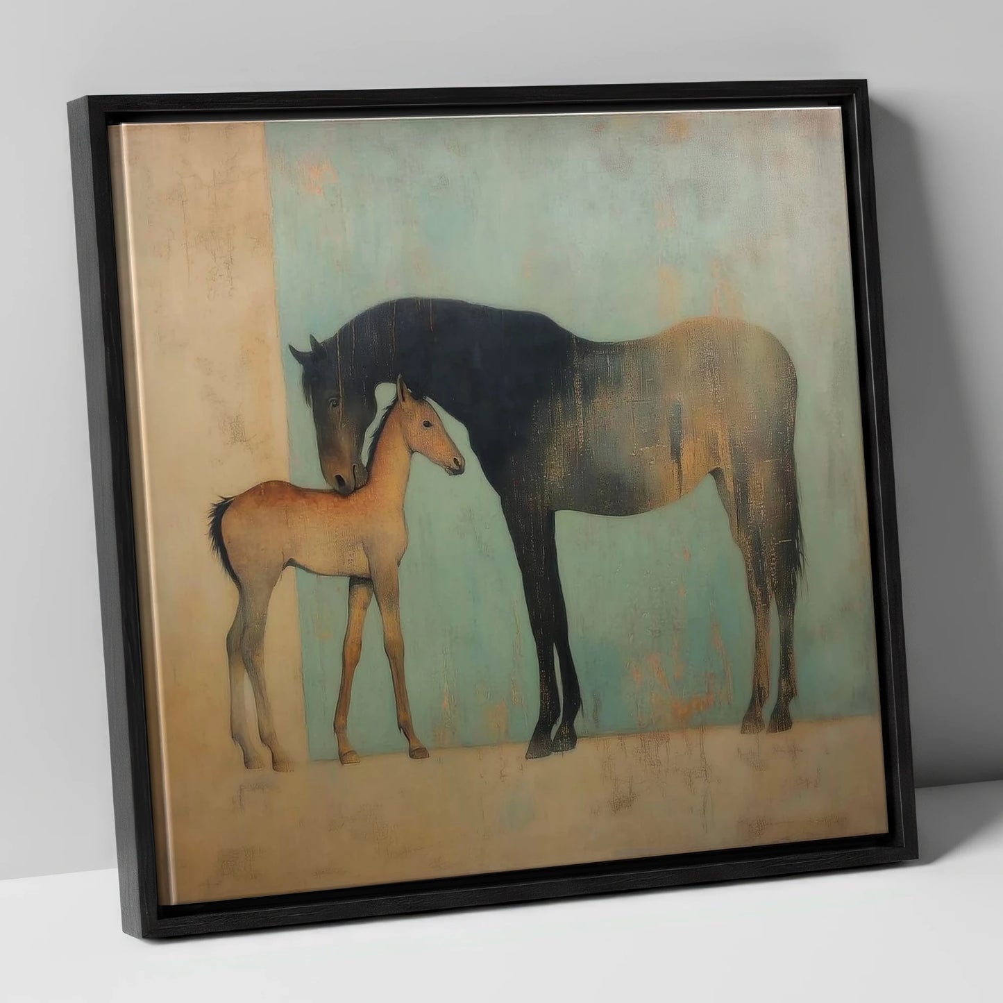 A Golden Bond mare & foal canvas wall art in black frame