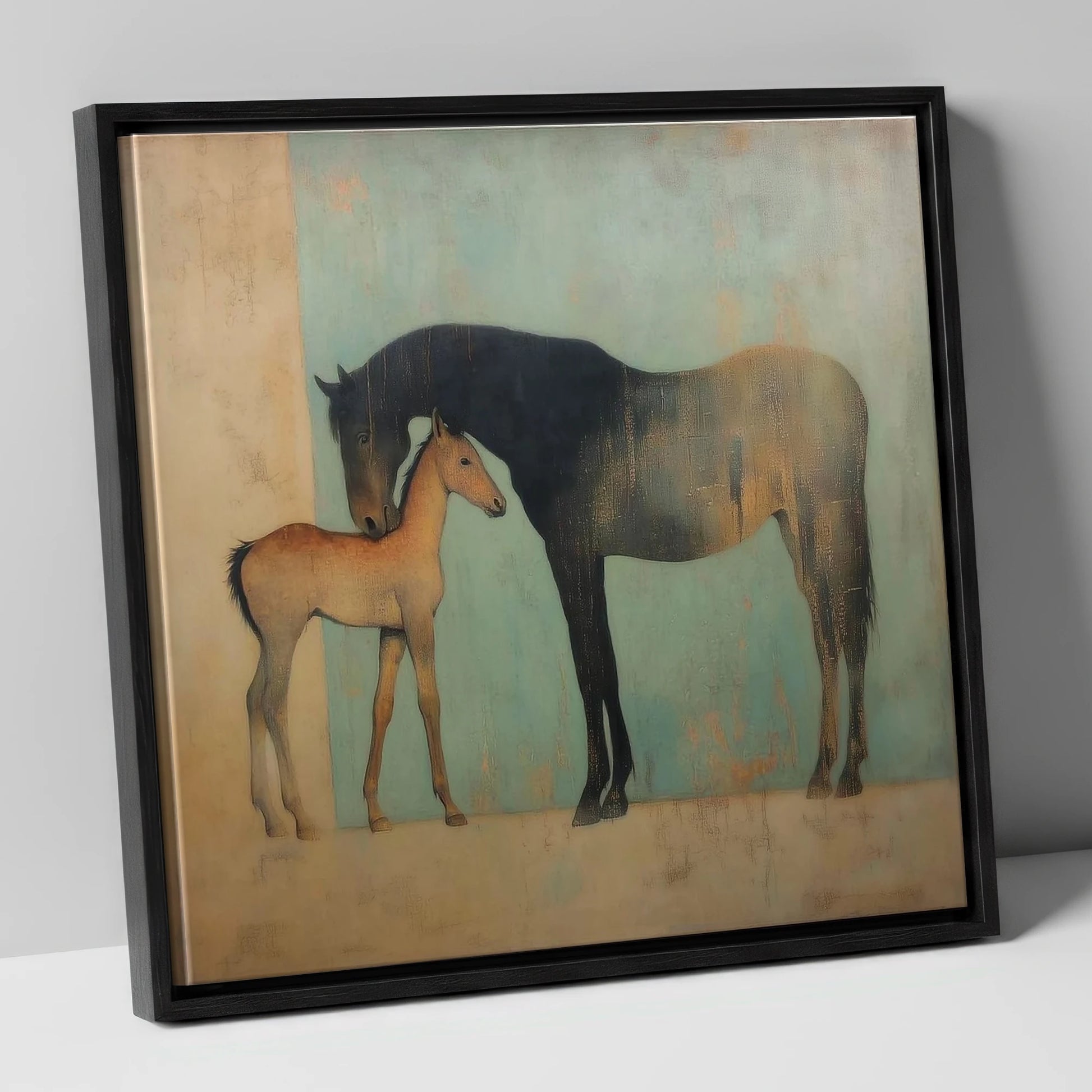 A Golden Bond mare & foal canvas wall art in black frame