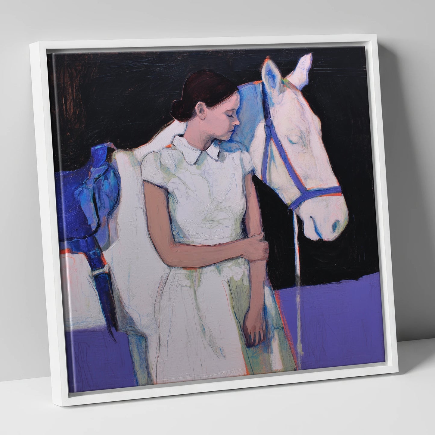 The Indigo Bond horse & rider canvas wall art in white frame