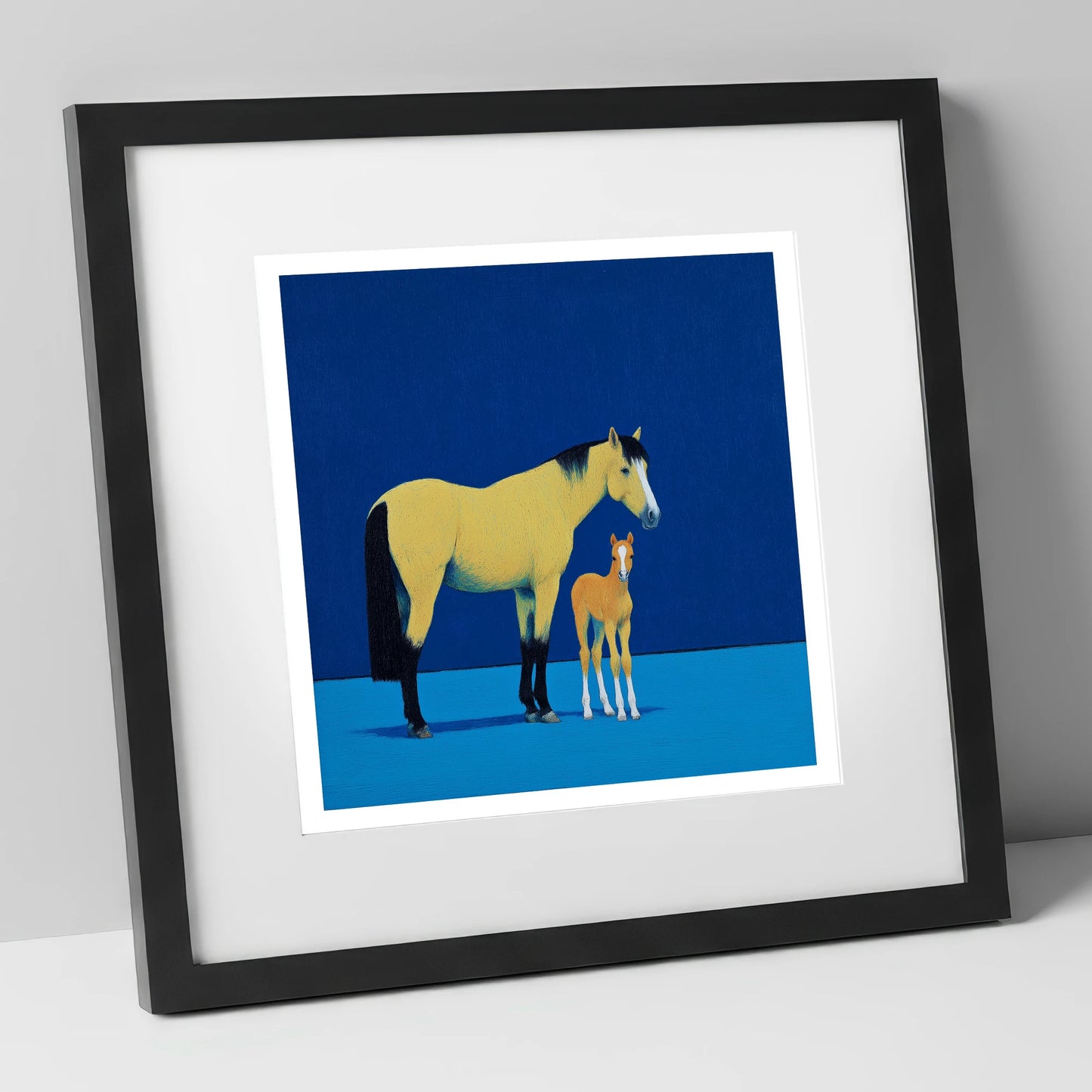 Striking Bonds in Blue mare & foal art print in black frame