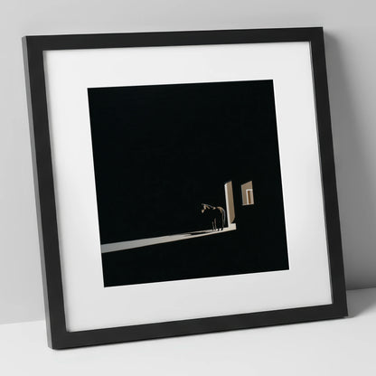 Solitary Light horse stable art print in black frame