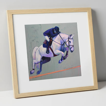 Suspended in Blue show jumping horse art print in natural frame