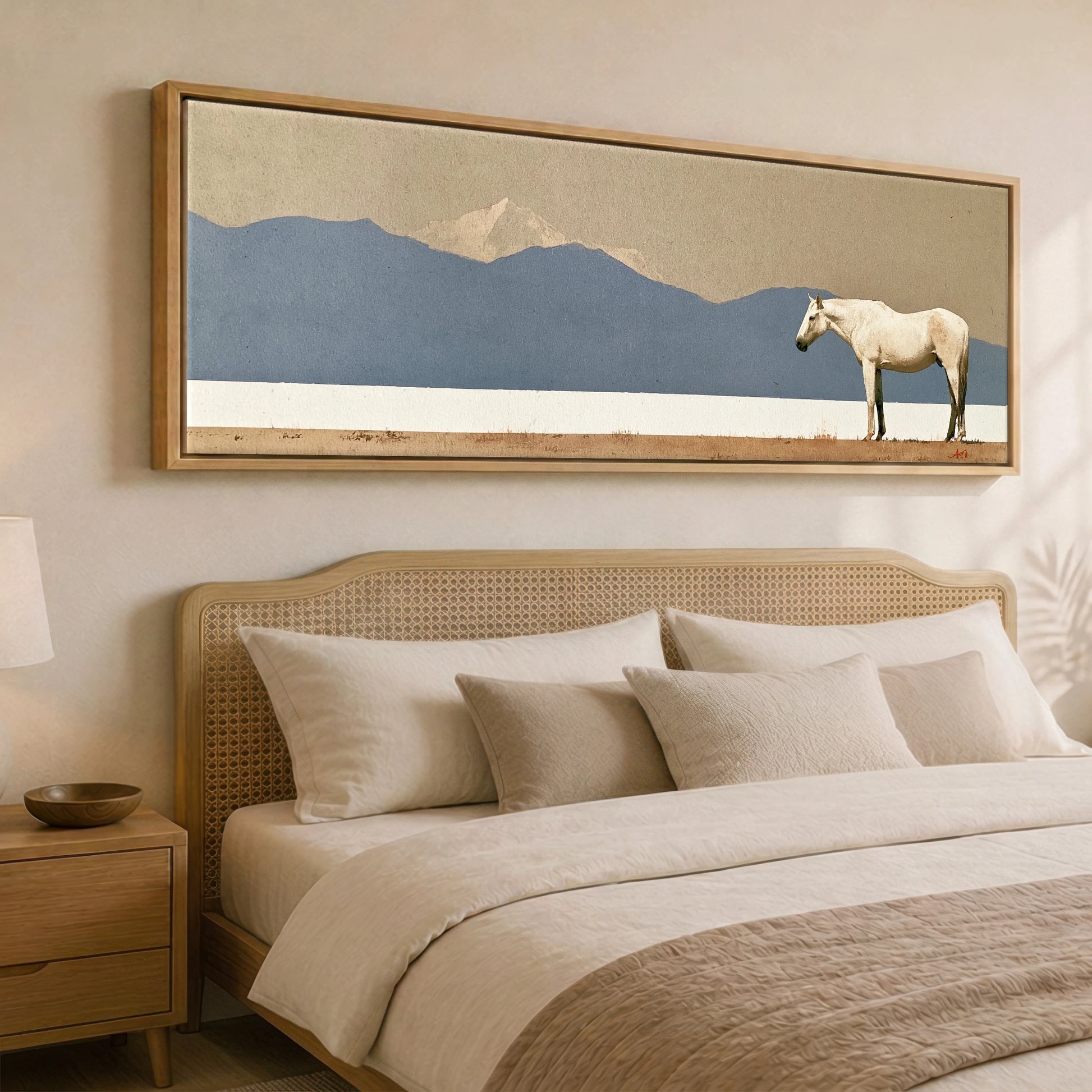 The Quiet Expanse Horse Landscape panoramic canvas wall art displayed above a bed