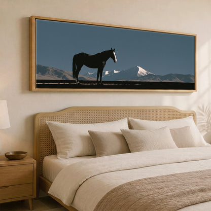 Summit Silhouette Horse Landscape panoramic canvas wall art displayed above a bed