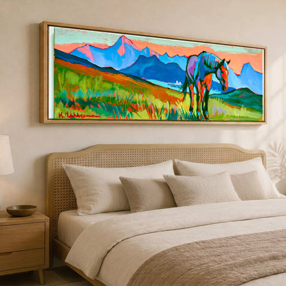 Technicolour Mountain Grazing Horse Landscape panoramic canvas wall art displayed above a bed