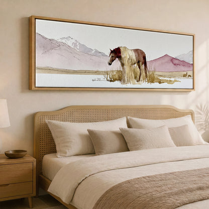 Quiet of the Range Horse Landscape panoramic canvas wall art displayed above a bed