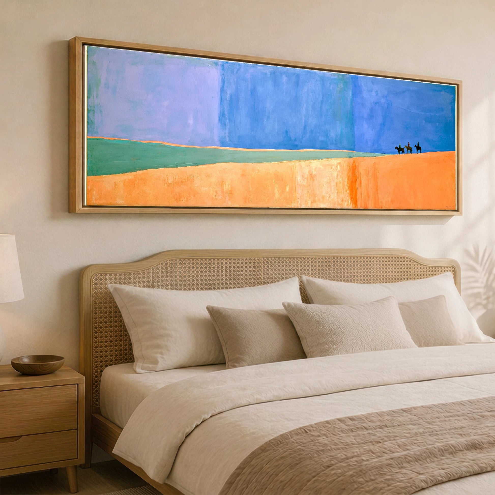 Vast Blue Horizons Horse & Rider panoramic canvas wall art displayed above a bed